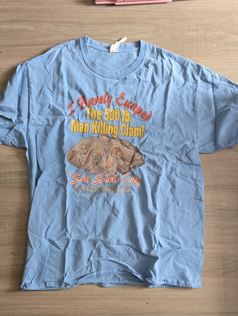 Light Blue Graphic Tee Sea Shell City "The 500 lb. Man Killing Clam"